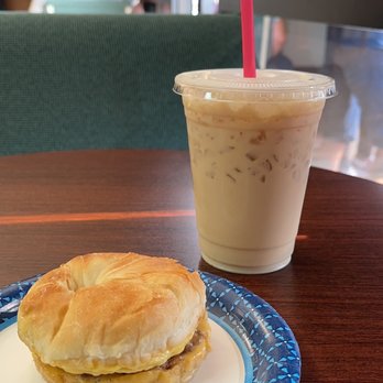 Grinds Coffee - a breakfast sandwich and iced coffee - Coffee & Tea Near Me - Cabot, Arkansas