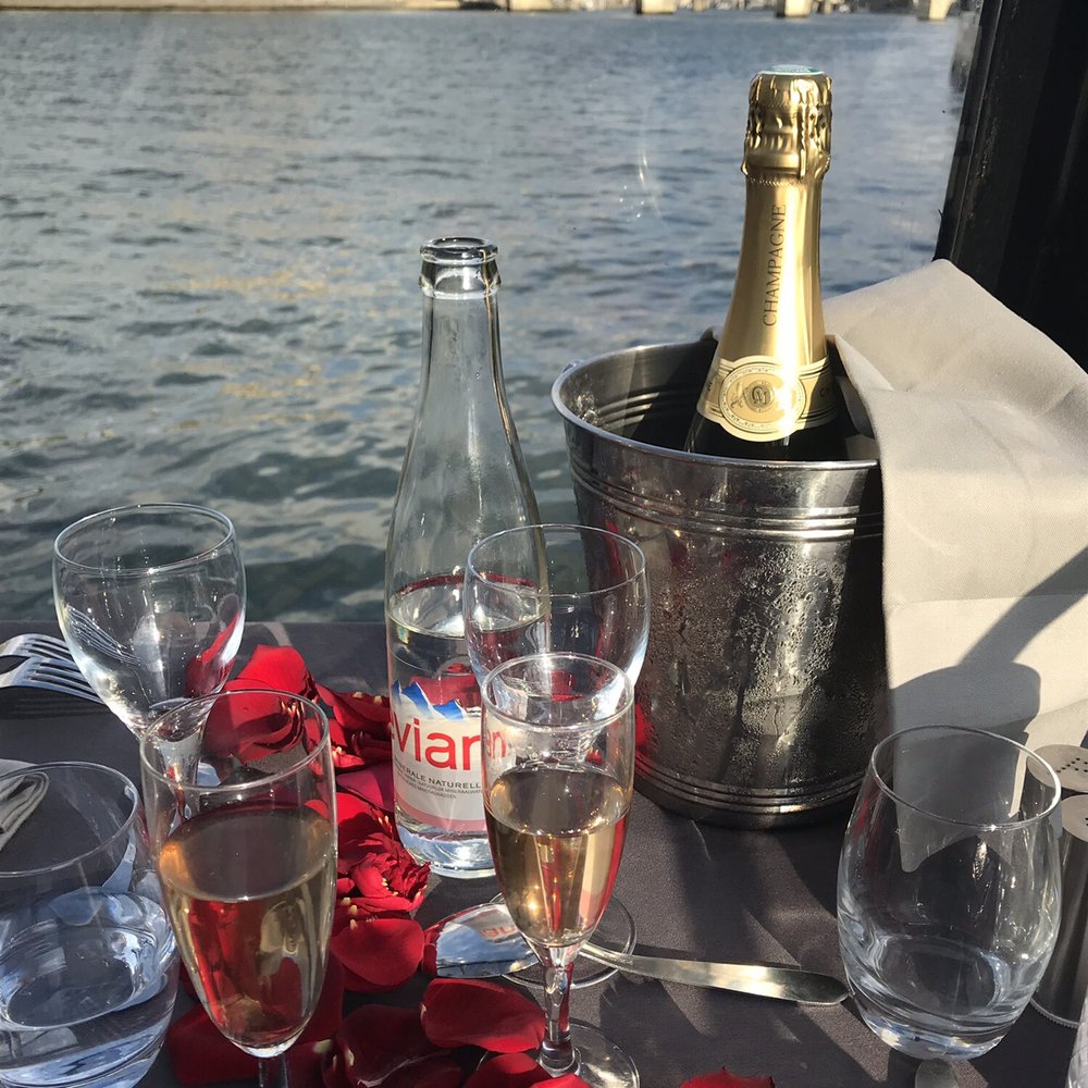 Marina de Paris - Champagne and rose petals on the table - French Near Me - Paris, 75