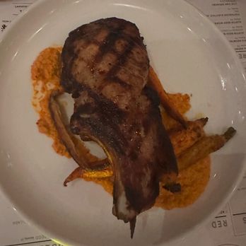 Sixty Vines - PORK CHOP roasted tri-color carrots, sage brown butter, pistachio & peppadew romesco - New American Near Me - Austin, Texas Sixty Vines - PORK CHOP roasted tri-color carrots, sage brown butter, pistachio & peppadew romesco - New American Near Me - Austin, Texas