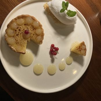 Nora Restaurant - This is on a 12 inch dinner plate!  Nice and tart Lemon Tart - Mediterranean Near Me - Chicago, Illinois
