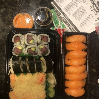Sushi World - 6 Piece Tuna Avocado Roll, Spider Roll and Crunchy roll on left. 8 pieces of salmon sushi on right. - Japanese Near Me - Chicago, Illinois