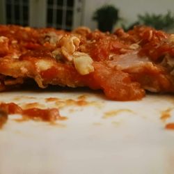 Gina Marie's - A thin flat Pizza That was supposed to be a deep dish with double ingredients.