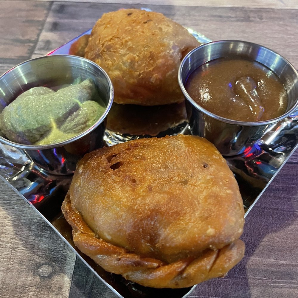 Nasha - Veggie Samosas with Mint and Tamarind chutney - Indian Near Me - Austin, Texas Nasha - Veggie Samosas with Mint and Tamarind chutney - Indian Near Me - Austin, Texas