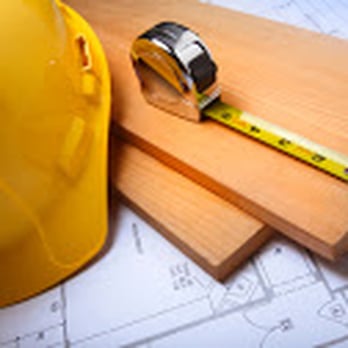 Justin Thompson Construction - a hard hat, measuring tape, and a piece of wood - General Contractors Near Me - Byron, Minnesota