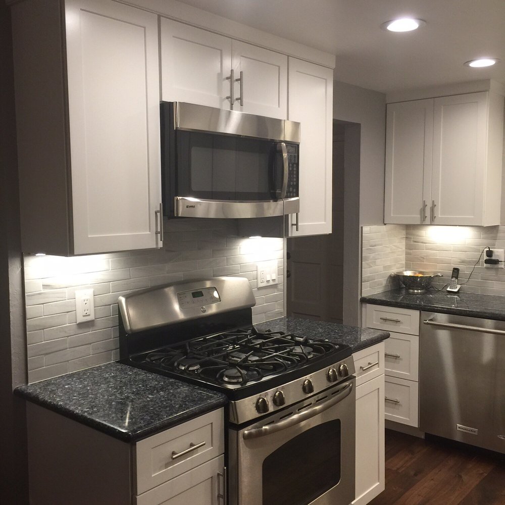 Bodhi Tree Construction - Moved stove/oven to the other side of the kitchen. Much more usable counter space on each side of the stove. - General Contractors Near Me