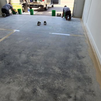 GarageExperts of Brevard - two men working on the floor - Flooring Near Me - Melbourne, Florida GarageExperts of Brevard - two men working on the floor - Flooring Near Me - Melbourne, Florida