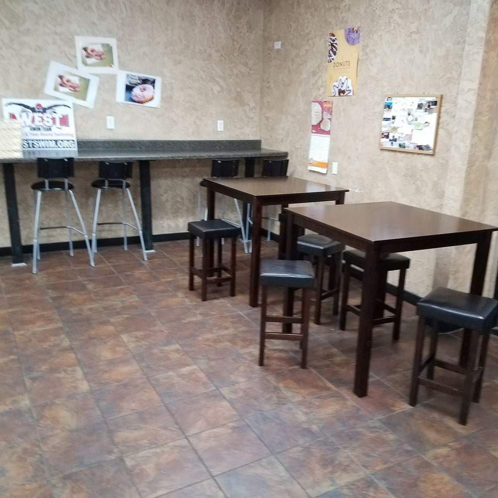 Delightful Donuts - tables and chairs in a restaurant - Donuts Near Me - Wichita Falls, Texas