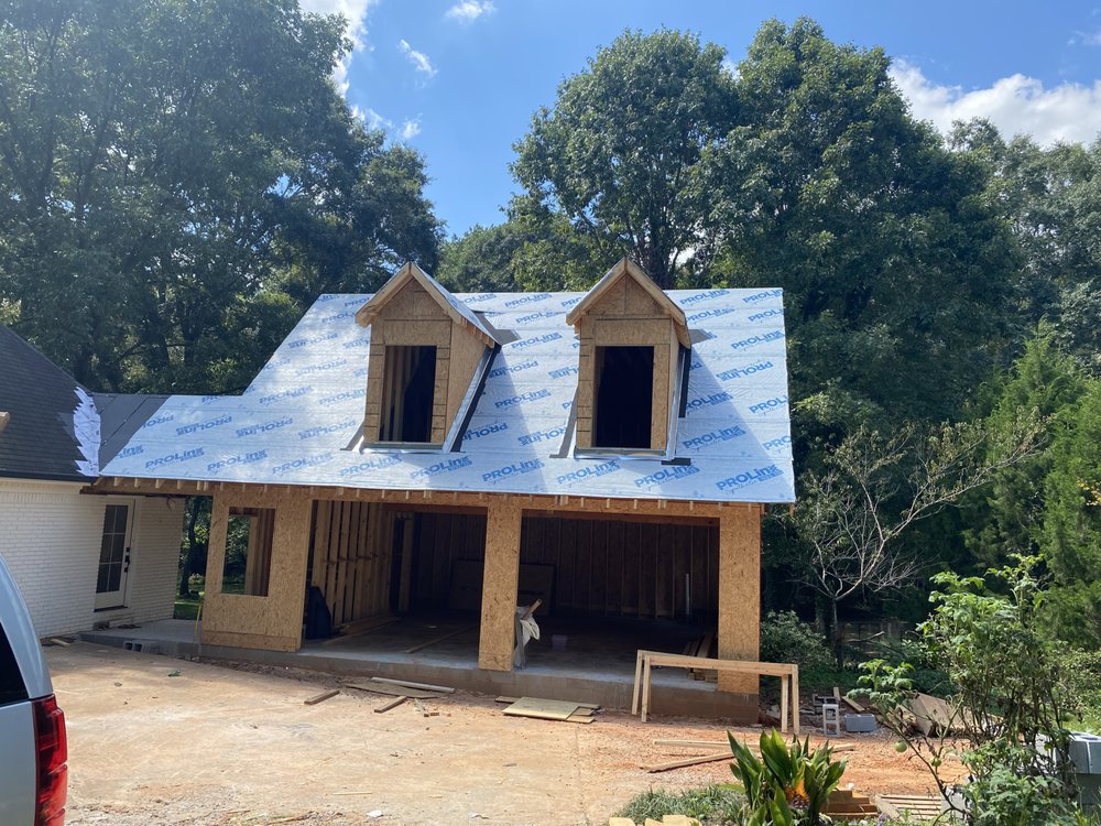 Slide of Rico’s Roofing Restorations