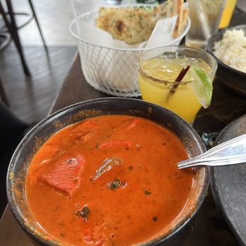 Spicy Affair - Chicken Tikka Masala. Mojito mock tail and garlic naan in the background - Indian Near Me - Swedesboro, New Jersey Spicy Affair - Chicken Tikka Masala. Mojito mock tail and garlic naan in the background - Indian Near Me - Swedesboro, New Jersey