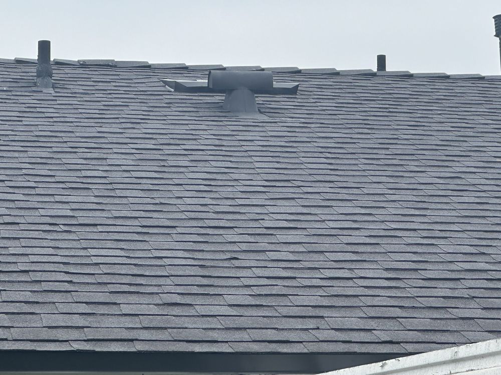 Slide of Shoreline Roofing