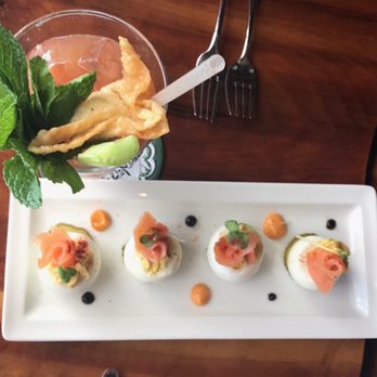 Trader Vic's - Deviled eggs with smoked salmon. Sooo good and never had something like this! - Hawaiian Near Me - Emeryville, California Trader Vic's - Deviled eggs with smoked salmon. Sooo good and never had something like this! - Hawaiian Near Me - Emeryville, California