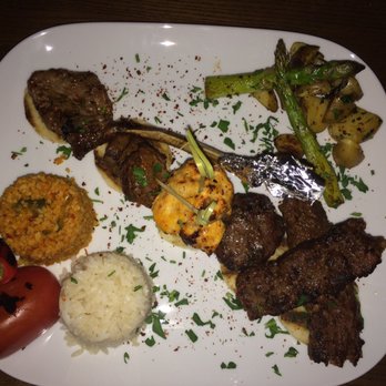 Midpoint Istanbul Fine Dining - The meat sampler. Lamb, beef and chicken grilled to perfection - Turkish Near Me - New Haven, Connecticut Midpoint Istanbul Fine Dining - The meat sampler. Lamb, beef and chicken grilled to perfection - Turkish Near Me - New Haven, Connecticut