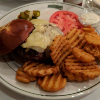 Wollensky Grill - Summer 2018 Special: The Butcher's Cut Burger with carmelized onions, bone marrow, and Pleasant Ridge Reserve cheese. - New American Near Me - New York, New York