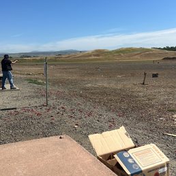 The people shooting their steel target. The people shooting their steel target.