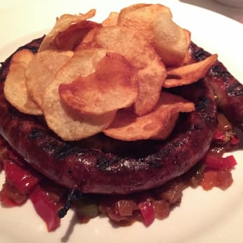 Aroma Osteria - Grilled thin sweet sausage served over Sicilian caponata and house made potato chips - Italian Near Me - Wappingers Falls, New York Aroma Osteria - Grilled thin sweet sausage served over Sicilian caponata and house made potato chips - Italian Near Me - Wappingers Falls, New York