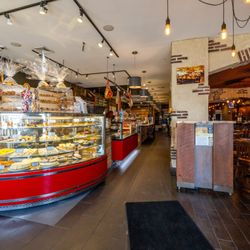 Touch Of Italy - Deli and wood-fired pizza station. Rehoboth Delaware location. Fresh Mozzarella made daily, Cookies, cakes, and cannoli from our bakery