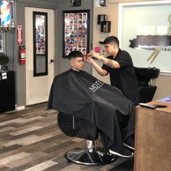 Cutting Edge Barbershop - Burst-bald fade.