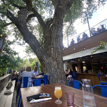 Tony Rigatoni's Italian Kitchen - Outdoor seating under the large tree comes with a nice breeze! - Italian Near Me - Morrison, Colorado Tony Rigatoni's Italian Kitchen - Outdoor seating under the large tree comes with a nice breeze! - Italian Near Me - Morrison, Colorado