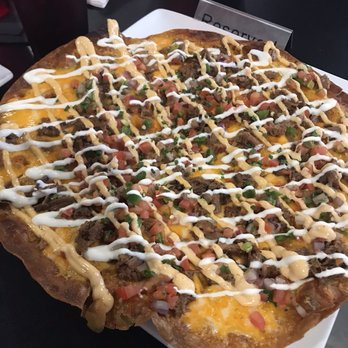 Putney's Pitstop Sports Bar and Grill - Brisket crisp! It's huge and delicious - Sports Bars Near Me - Tucson, Arizona Putney's Pitstop Sports Bar and Grill - Brisket crisp! It's huge and delicious - Sports Bars Near Me - Tucson, Arizona