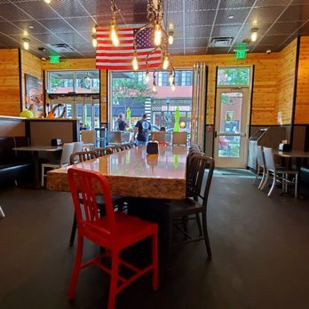 BurgerFi - Indoor and outdoor seating; lots of fresh air inside with accordion glass doors open :) - Burgers Near Me - North Bethesda, Maryland BurgerFi - Indoor and outdoor seating; lots of fresh air inside with accordion glass doors open :) - Burgers Near Me - North Bethesda, Maryland