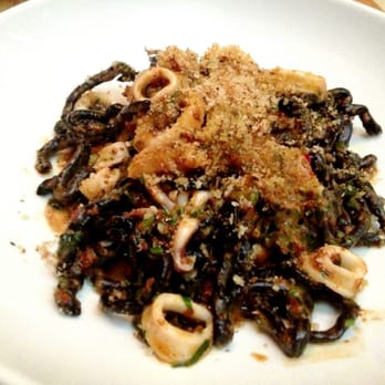 Amali - Looks scary but was SO GOOD! Black squid ink pasta with a spicy chorizo-like sauce - Mediterranean Near Me - New York, New York