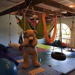 The Learning Fountain - Mr. Bear enjoying the Gross Motor Room