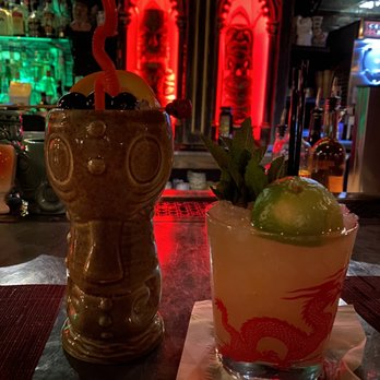 Cellar 335 - Three dots on the left, Mai Tai on the right. Classically garnished with a spent lime shell. - Cocktail Bars Near Me - Jersey City, New Jersey Cellar 335 - Three dots on the left, Mai Tai on the right. Classically garnished with a spent lime shell. - Cocktail Bars Near Me - Jersey City, New Jersey