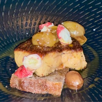 Partage - Foie Gras: with cooked grapes, dried grapes & a dense fruit bread. Rich strong heavy flavors 4* - French Near Me - Las Vegas, Nevada Partage - Foie Gras: with cooked grapes, dried grapes & a dense fruit bread. Rich strong heavy flavors 4* - French Near Me - Las Vegas, Nevada