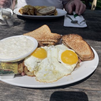 Lures Riverfront Restaurant - Corned beef hash, eggs in's grits. - Bars Near Me - Jensen Beach, Florida Lures Riverfront Restaurant - Corned beef hash, eggs in's grits. - Bars Near Me - Jensen Beach, Florida