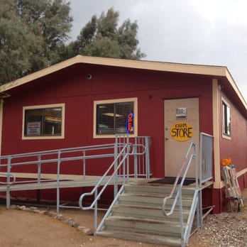 San Xavier Co-op Farm - a red building with stairs leading up to it - Farmers Market Near Me - Tucson, Arizona San Xavier Co-op Farm - a red building with stairs leading up to it - Farmers Market Near Me - Tucson, Arizona