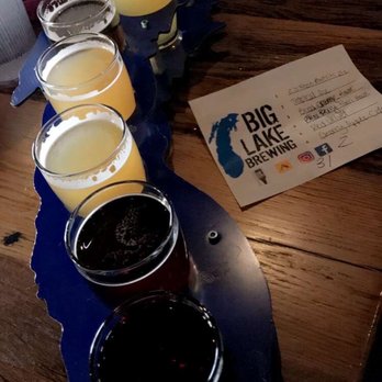 Big Lake Brewing - My flight! They use Lake Michigan holders which is so cool! - Bars Near Me - Holland, Michigan