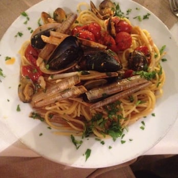 AL Caminetto - Spaghetti ai frutti di mare. Perfectly al denote and not too salty! Good amount of olive oil! - Italian Near Me - Salerno, SA