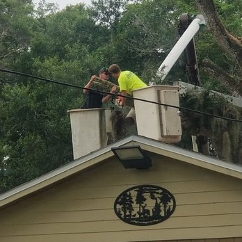 Hobbs Tree Service - Removing over hanging limbs away from your roof will help protect it from damage and extend the life of your home. - Tree Services Near Me - Titusville, Florida Hobbs Tree Service - Removing over hanging limbs away from your roof will help protect it from damage and extend the life of your home. - Tree Services Near Me - Titusville, Florida