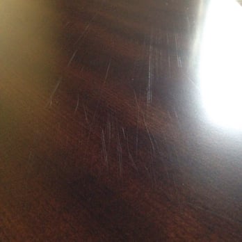 Two Men and a Truck Plainfield - Scratched dining room hutch - Movers Near Me - Plainfield, Illinois Two Men and a Truck Plainfield - Scratched dining room hutch - Movers Near Me - Plainfield, Illinois