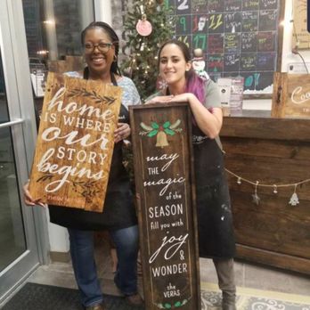 Board & Brush Creative Studio - My coworker and I with our finished projects. - Paint & Sip Near Me - KENDALL PARK, New Jersey