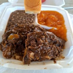 Vivians Homestyle Cooking - Smothered neck bones, yams, black eye peas and gravy with rice.
