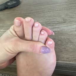 Gel pedicure. Only did 2 coats of polish, didn't let it dry and it was all over my skin. Also note how they cut and filed my nails.