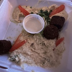 Rotana Restaurant & Hookah Lounge - I had three bites to taste each item in the sampler. Basically arrived in this horrible condition and green salad stuff is missing!