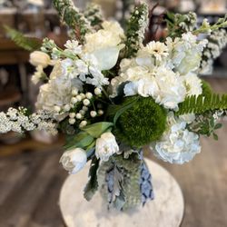 The White Orchid - Fresh white floral arrangement.