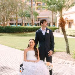Carl Axen Clothier - Jack and Erin wedding photo showcasing bespoke suit from carl axen clothier custom suits Orlando