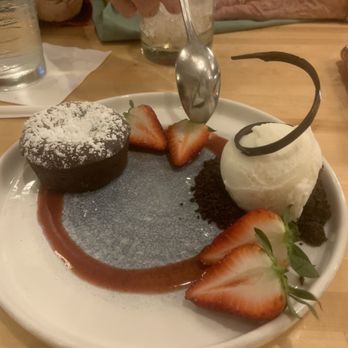Olivia's Cafe - Our scrumptious dessert: chocolate lava cake - New American Near Me - Lake Buena Vista, Florida Olivia's Cafe - Our scrumptious dessert: chocolate lava cake - New American Near Me - Lake Buena Vista, Florida