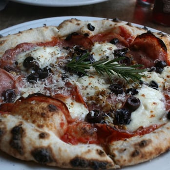 Cafe Reyes - Can't remember what they call this one but it has salami and olives...yum. - Pizza Near Me - Point Reyes Station, California