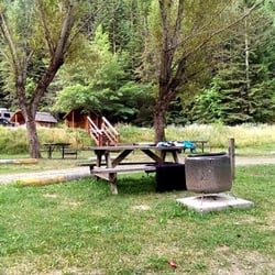 Camp Coeur d’Alene - The view from my tent of the table and fire pit that all camp sites come with