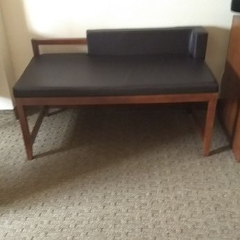 Comfort Suites Airport - Nice bench for sitting or holding luggage and other personal items. - Hotels Near Me - Jacksonville, Florida