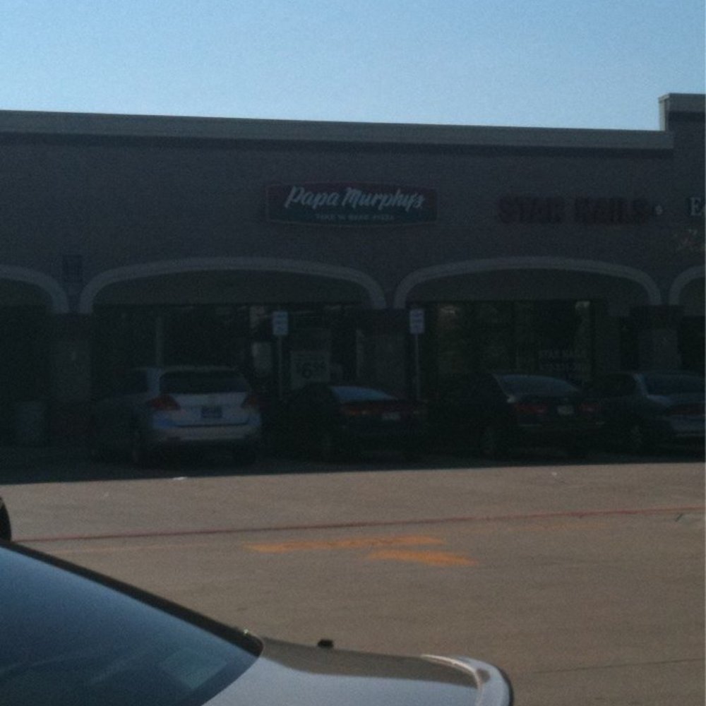 a car parked in front of a store