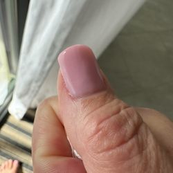 A Nail Salon - Product clumped on sides of cuticles