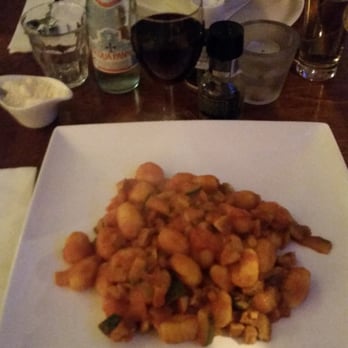 Isola Bella - Gnocci with ragu (zucchini squash, veal tidbits, basic tomato) sauce - Italian Near Me - Amsterdam, New Hampshire Isola Bella - Gnocci with ragu (zucchini squash, veal tidbits, basic tomato) sauce - Italian Near Me - Amsterdam, New Hampshire