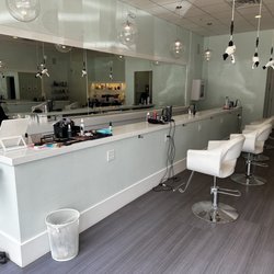 h2blow the blowdry + makeup bar - It was interesting having the hairdryers hanging from the cord above.