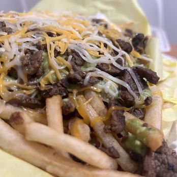 Albertaco's Mexican Food - More toppings on the fries side of my half-Carne Asada Nachos & half-Carne Asada Fries - Mexican Near Me - Vista, California