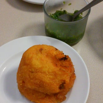 Cafe Central - Papa rellena and a refreshing and spicy relish - Puerto Rican Near Me - Chicago, Illinois Cafe Central - Papa rellena and a refreshing and spicy relish - Puerto Rican Near Me - Chicago, Illinois